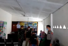 Polsek Tambelang Monitoring Vaksinasi Covid -19