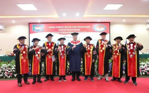 Bupati Zaki Raih Gelar Doktor Sangat Memuaskan