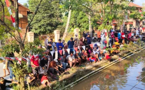 Ketahanan Nasional Desa Cibalok: Proyek Sosial Penaburan 100.000 Benih Ikan di Sungai Cibalok